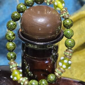 Green Beaded Stretch Bracelet with Gold Accents
